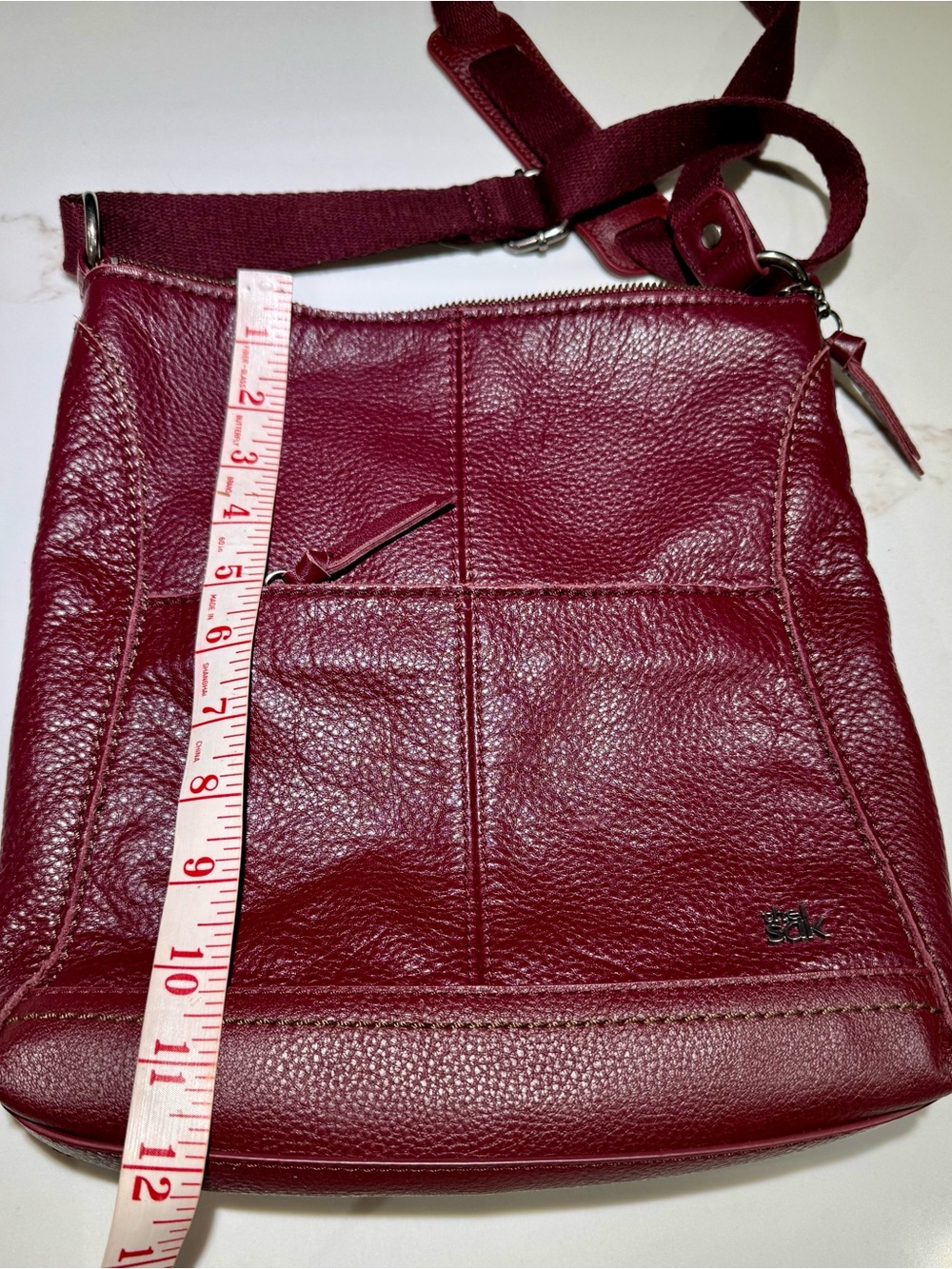 the SAK Leather Messenger Crossbody Dark Red Maroon